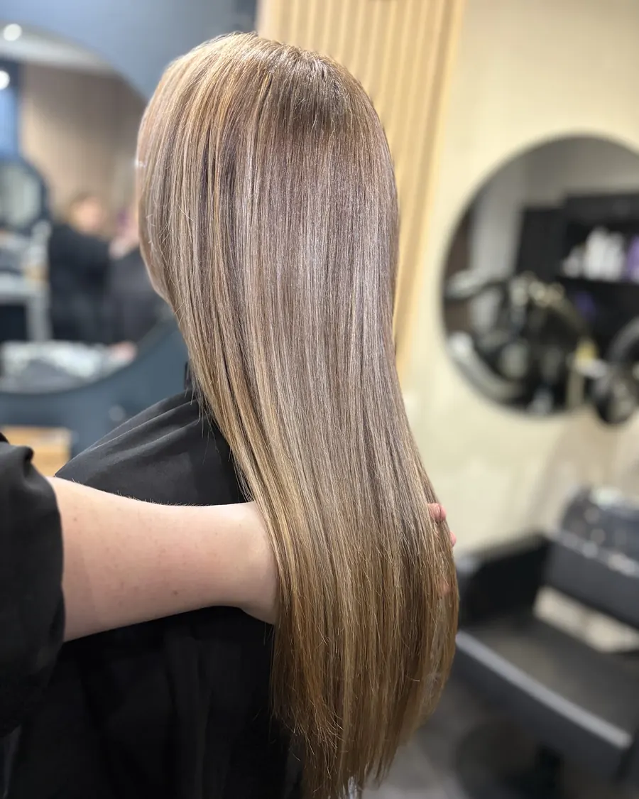 Balayage blond sur cheveux longs réalisé au salon — coiffeur à Calais